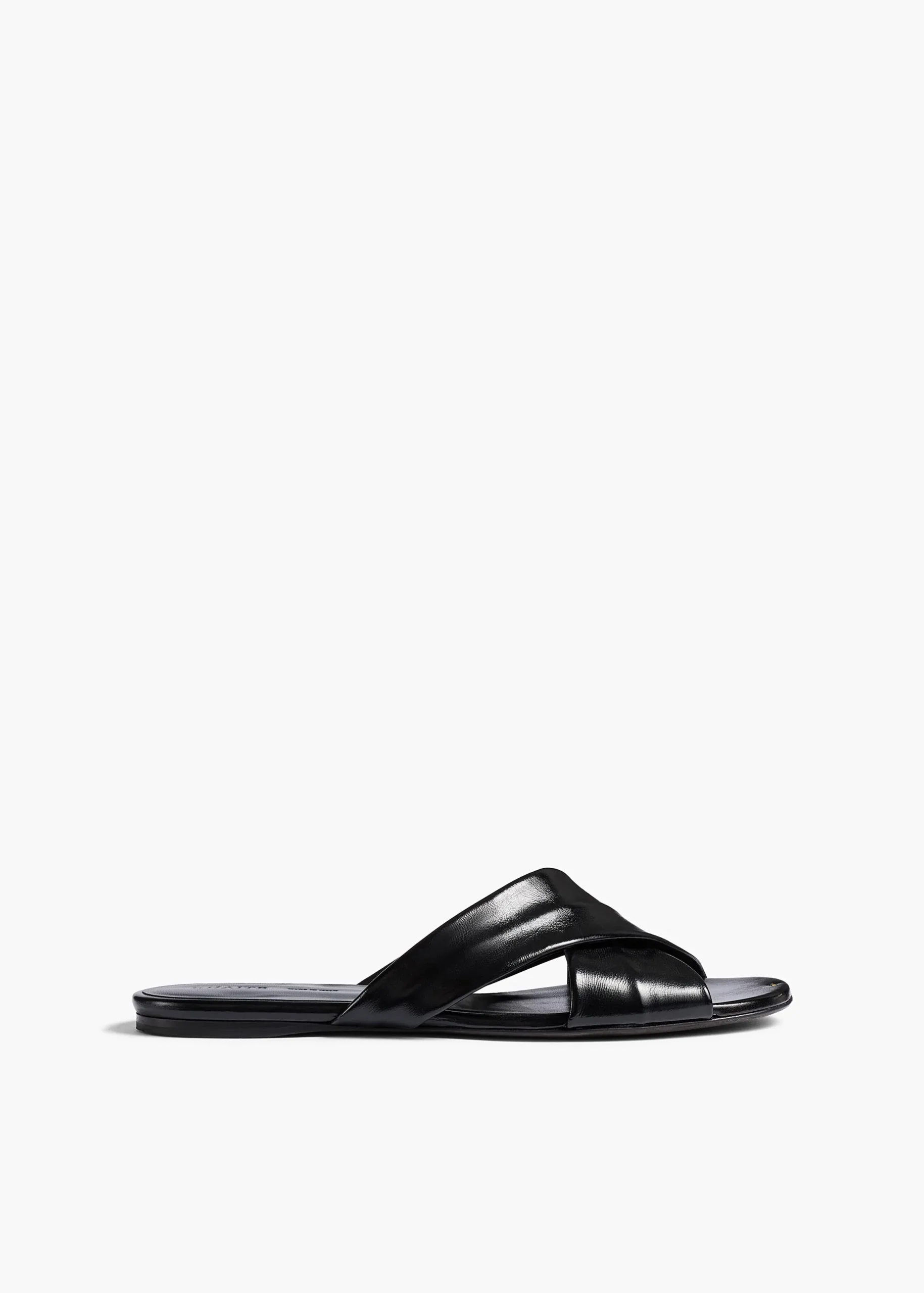 Liria Flat Sandal in Black Glazed Leather