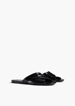 Liria Flat Sandal in Black Glazed Leather