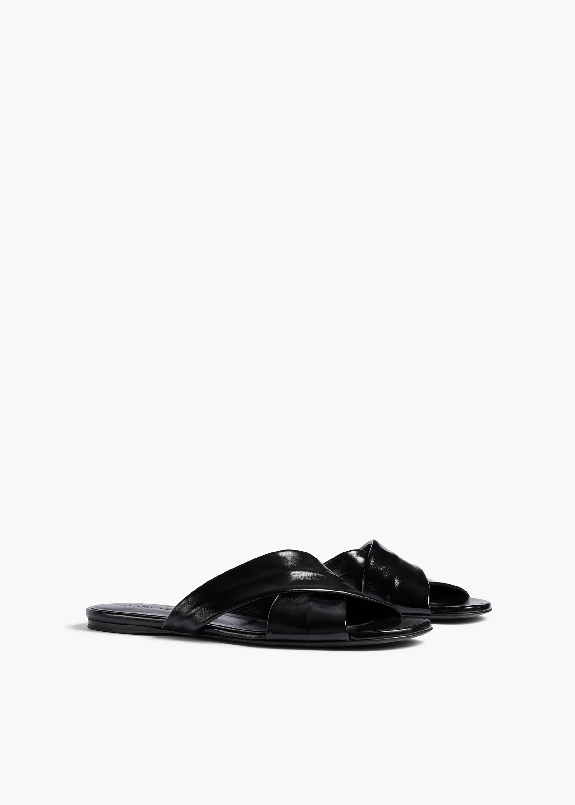 Liria Flat Sandal in Black Glazed Leather